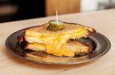 CHEESY grilled cheese ----- melted provolone, english cheddar and mascarpone, butter, brioche bread